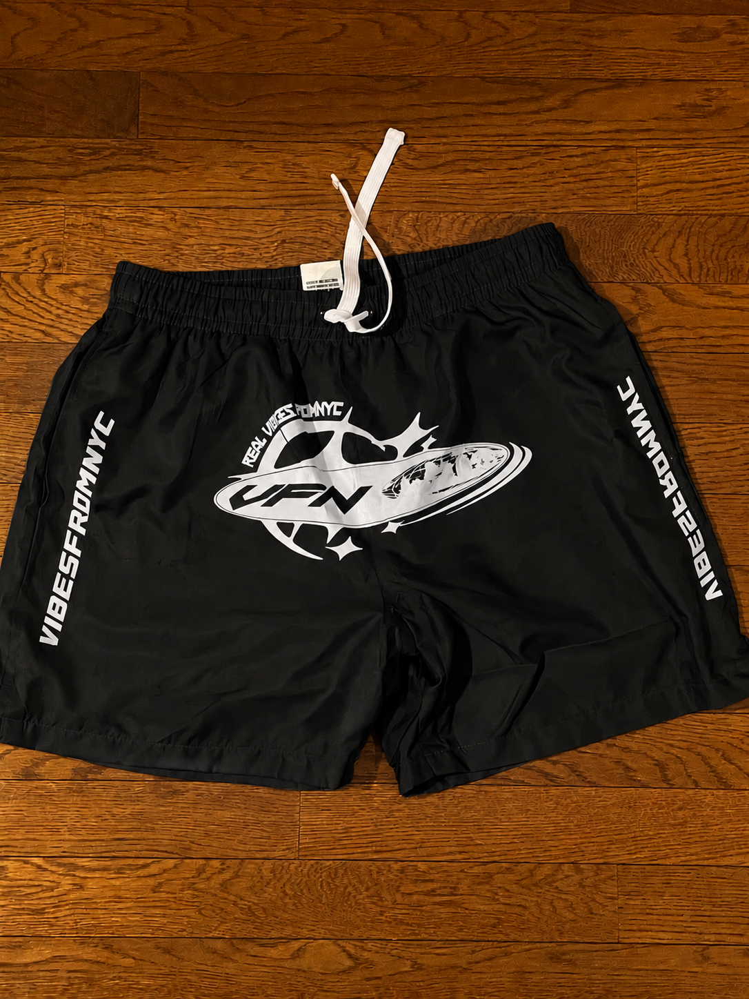 VIBESFROMNYC Drawstring Shorts Vertical Branding Detail